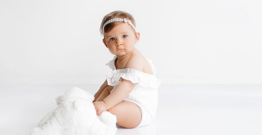 Simple and Pure baby photography in white studio