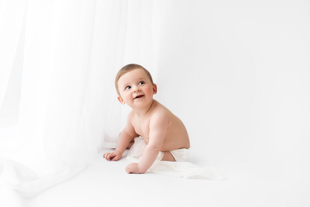 Baby Milestone Photography. Sitter photography session. All-white studio photography. Minimalistic baby photography